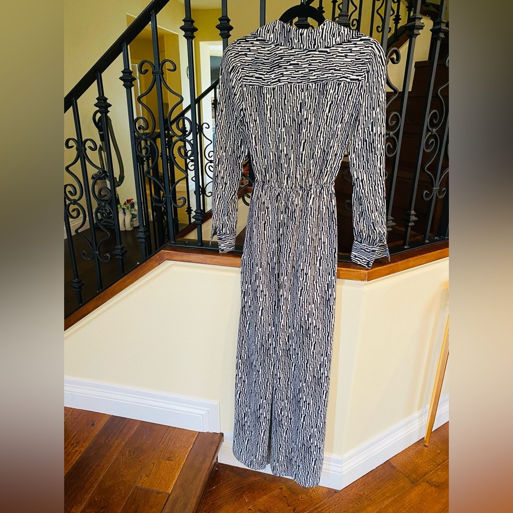Boston Proper maxi dress. Blue/ white pattern. Deep plunge neckline. Trim waist.